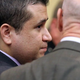 George Zimmerman confers with his lawyer in court after his acquittal. (Pool/Getty Images)